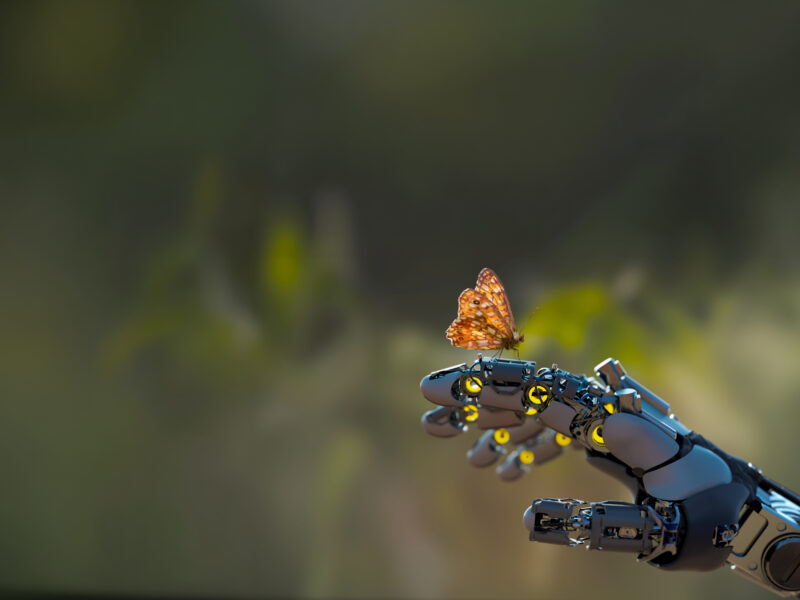 Sensitive AI Robot Head Holding Butterfly